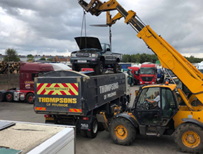 pickup lifted from tipper