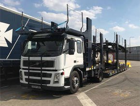 white volvo fm12 transporter